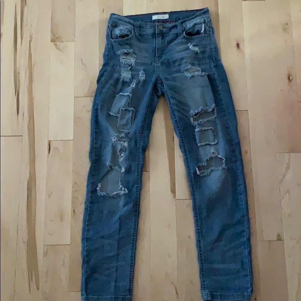 Patchy, ripped jeans